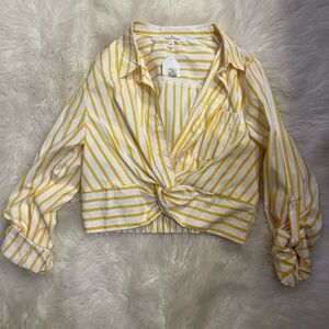 1970s inspired yellow and white striped blouse